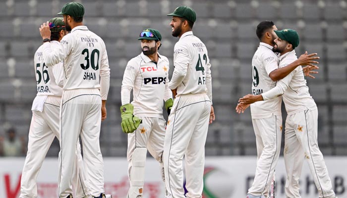 Pakistan players celebrate after the dismissal of Bangladesh Najmul Hossain Shanto during the third day of the second Test cricket match between Bangladesh and Pakistan at the Sylhet International Cricket Stadium in Sylhet on May 18, 2026. — AFP