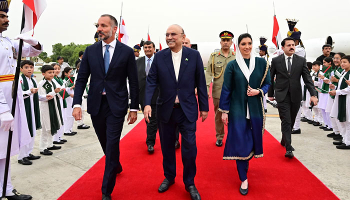 Prince Rahim Aga Khan V (left), flanked by President Asif Ali Zardari (Centre) and First Lady Aseefa Bhutto Zardari, is received at the Nur Khan Airbase on May 20, 2026. — X/@PresOfPakistan