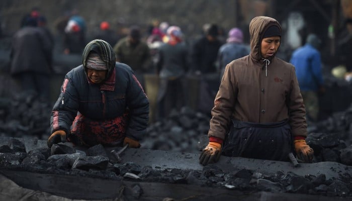 Representational image shows workers at a coal mine in Huaibei, in northern Chinas Anhui province. — AFP