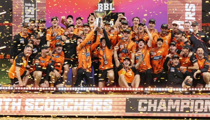 Perth Scorchers players celebrate their win after the Big Bash League T20 final between Perth Scorchers and Sydney Sixers at the Optus Stadium in Perth, Australia, on January 25, 2026. (AFP)