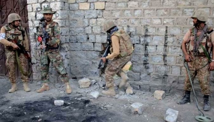 Security forces are seen taking position during an operation in this undated photo. — ISPR/File