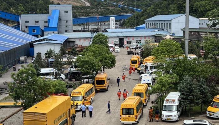 A general view of rescue team members and emergency vehicles arriving at the Liushenyu coal mine after a gas explosion in Changzhi, in northern Chinas Shanxi province, May 23, 2026. — AFP