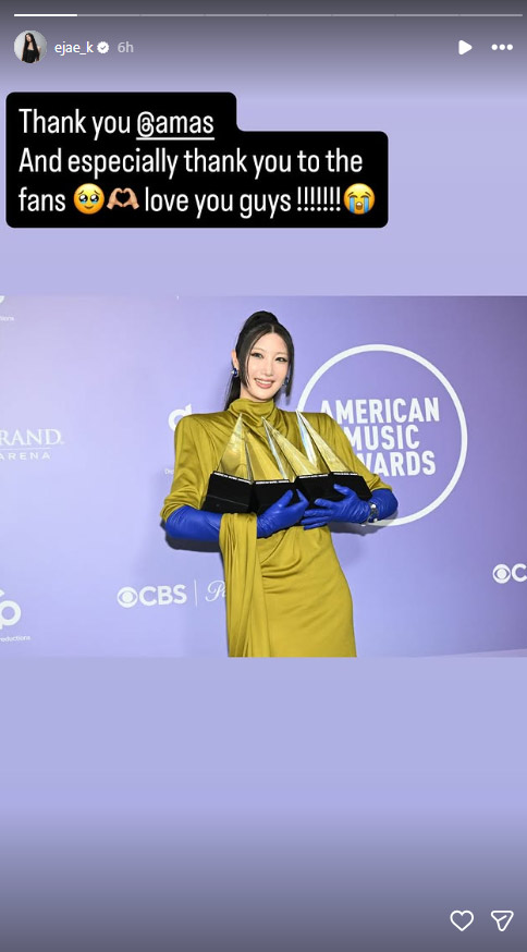 Golden hitmaker EJAE strikes pose with four trophies after AMAs win
