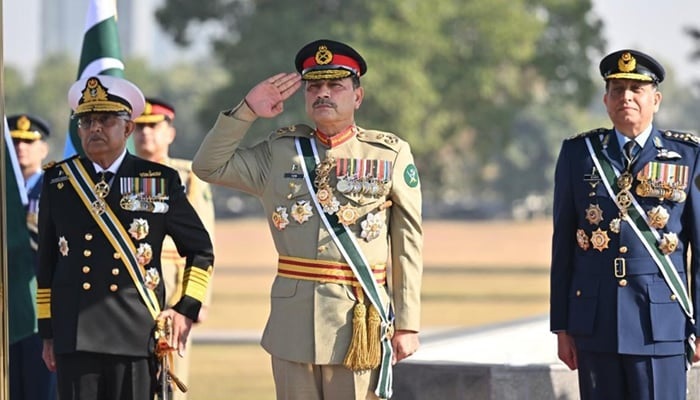 Field Marshal Syed Asim Munir (centre), Admiral Naveed Ashraf, Chief of the Naval Staff (left) and Air Chief Marshal Zaheer Ahmed Babar Sidhu, Chief of Air Staff at the General Headquarters in Rawalpindi on December 8, 2025. — ISPR
