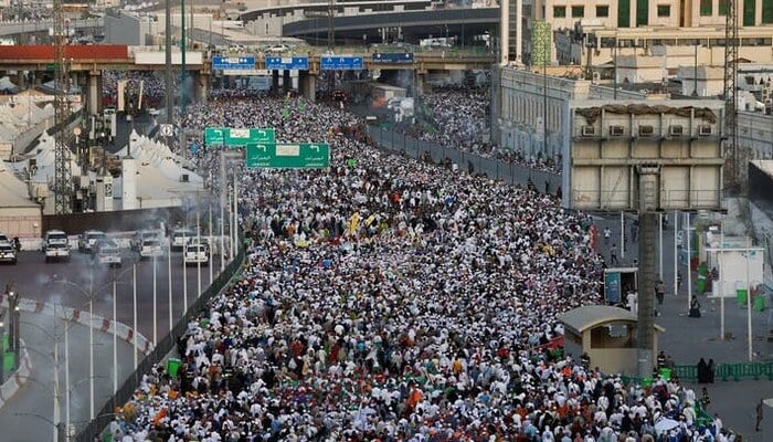 Muslim pilgrims walk on the second day of the stoning ritual, during the annual hajj pilgrimage in Mina, Saudi Arabia, May 28, 2026. — Reuters