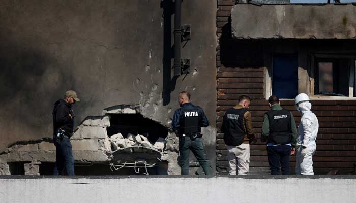 Romanian law enforcement officers work on the site of an explosion at a residential block of flats following a drone hit close to the border with Ukraine, in Galati, Romania, May 29, 2026. — Reuters