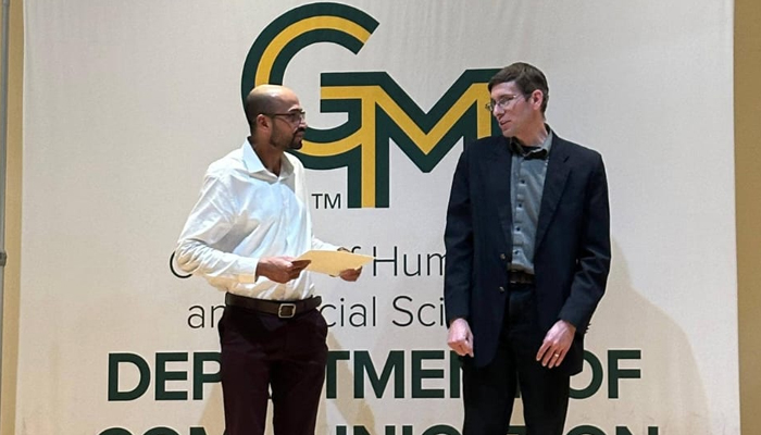 Pakistani academic, Syed Muhammad Abubakar (left), during the award ceremony at George Mason University (GMU), US.