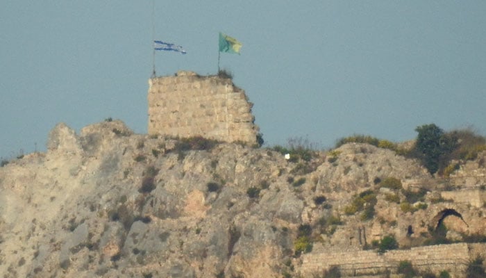 An Israeli flag and a flag of the Golani Brigade are raised on Beaufort Castle, as seen from Marjayoun, southern Lebanon, May 31, 2026. — Reuters