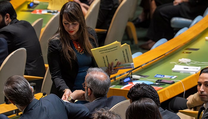 An usher hands out ballots to delegations for the election of non-permanent members of the United Nations Security Council at UN headquarters in New York City, US, June 3, 2026. — Reuters