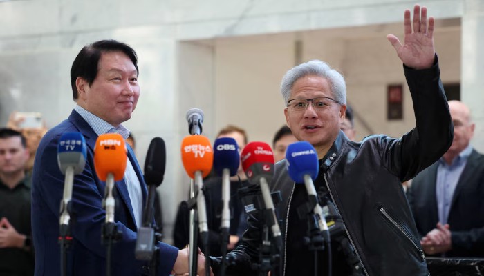 Nvidia CEO Jensen Huang shakes hands with SK Group Chairman Chey Tae-won after a media briefing following their meeting at SK group’s office building in Seoul, South Korea, June 8, 2026. — Reuters