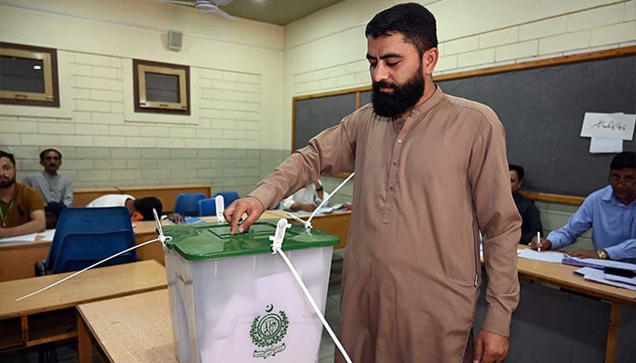 A voter casts his vote at a polling station during the Gilgit-Baltistan General Elections 2026. — APP