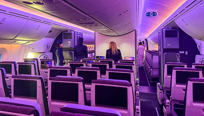 Hostesses stand inside a Boeing 787-9 Dreamliner aircraft of Saudi airline Riyadh Air at King Khalid International Airport in Riyadh on June 7, 2026. — AFP