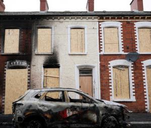 Knife attack victim's family calls for calm after anti-immigrant violence in Belfast