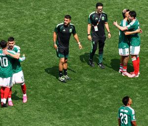 Mexico get World Cup party started with 2-0 win over nine-man South Africa