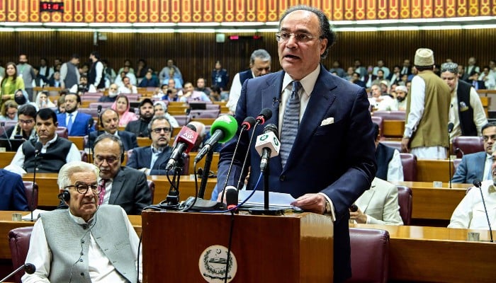 This handout photograph, taken on June 12, 2026 and released by the National Assembly, shows Finance Minister Muhammad Aurangzeb presenting the 2026-27 fiscal budget at the Parliament House in Islamabad. — AFP