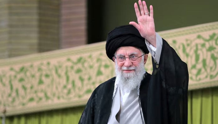 Irans late Supreme Leader Ayatollah Ali Khamenei waves during a meeting with students in Tehran, Iran, November 2, 2024.