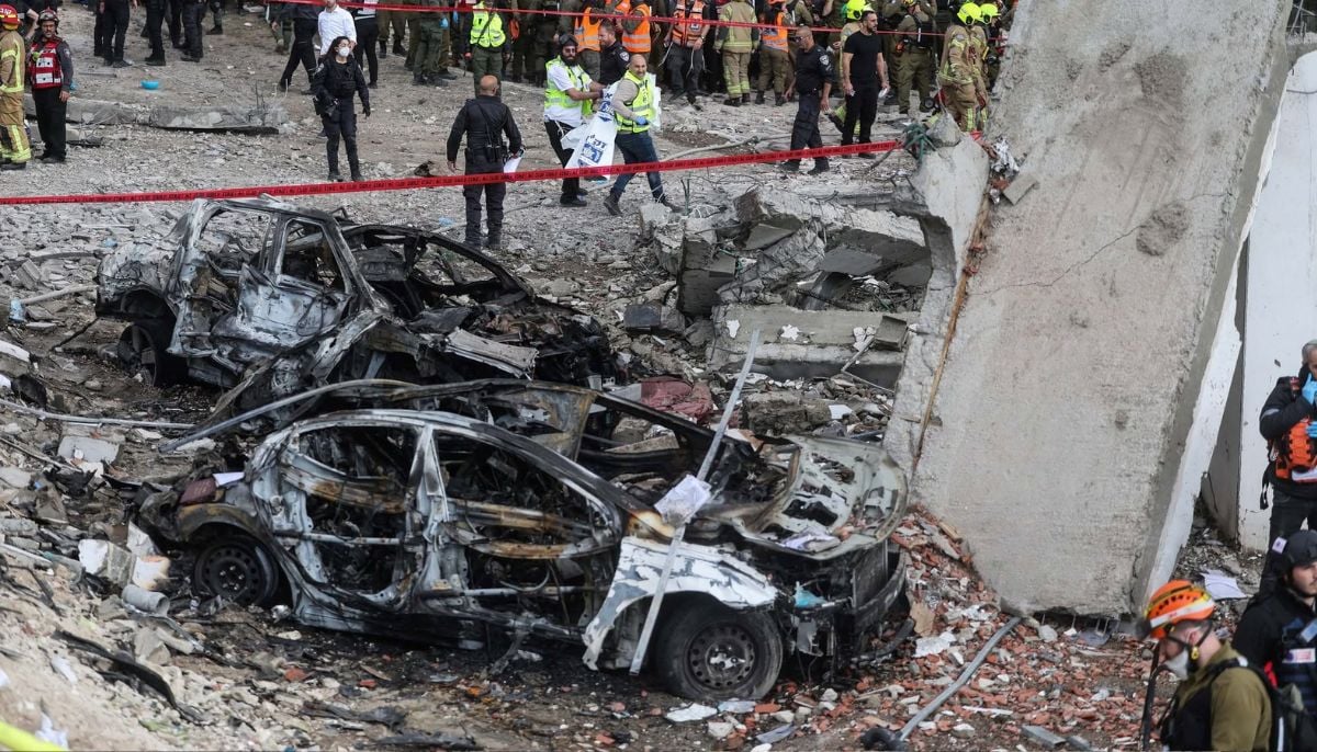 Emergency personnel work at the site of an Iranian strike in Beit Shemesh, Israel March 1, 2026. — Reuters