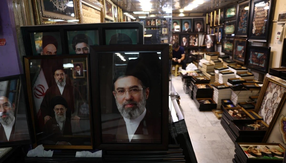 On March 9, 2026, Mojtaba Khamenei was named Irans Supreme Leader.  Mojtaba Khameneis pictures along with those of late Supreme Leader Ayatollah Ali Khamenei are displayed in a store in Tehran, Iran June 7, 2026. — Reuters