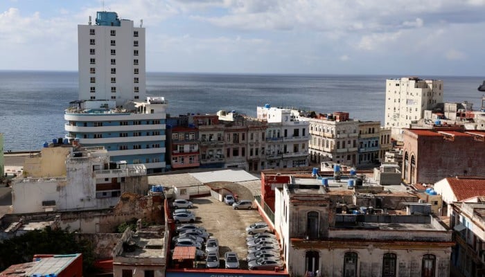 A parking lot for tourist rental cars on a rooftop amidst residential buildings before the Cuban government presents far-reaching economic measures that could mark the most significant shift toward a market economy since the 1959 revolution, in Havana, Cuba, June 17, 2026. — Reuters