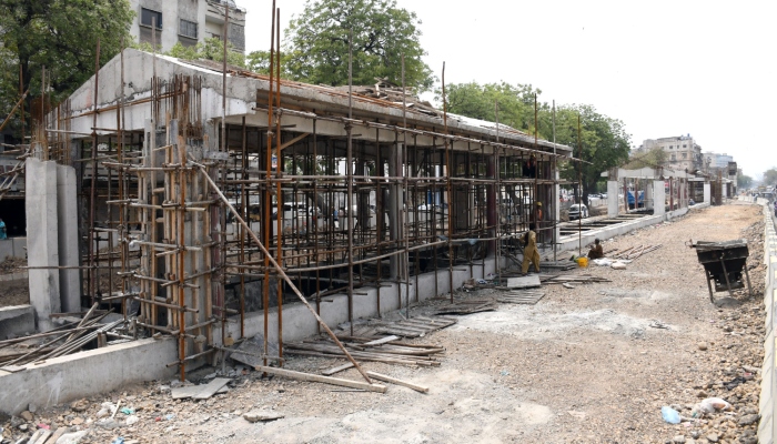 Labourers busy in construction of Green Line BRT station during extension work in Karachi on March31, 2026. — Online