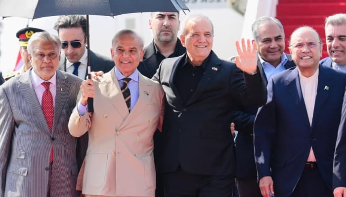 Iranian President Masoud Pezeshkian (second from right) land in Islamabad on June 23, 2026. — X/@GovtofPakistan