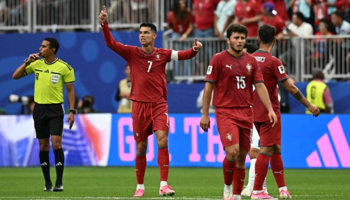 Portugals forward Cristiano Ronaldo (centre) celebrates scoring his teams third goal during the 2026 World Cup Group K football match between Portugal and Uzbekistan at the Houston Stadium in Houston, June 23, 2026. — AFP