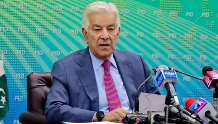 Defence Minister Khawaja Asif addresses a press conference in Islamabad. — PID/File