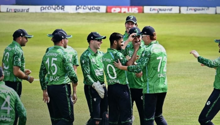 Ireland players celebrate a wicket during their first T20I against India at the Civil Service Cricket Club in Belfast, June 26, 2026. — X/@cricketireland