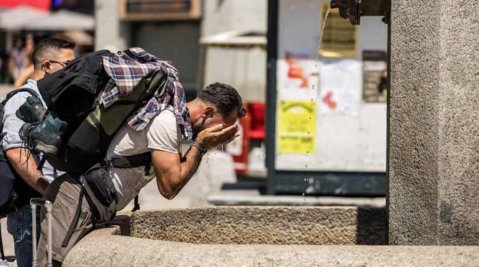 Records tumble as European heatwave moves east