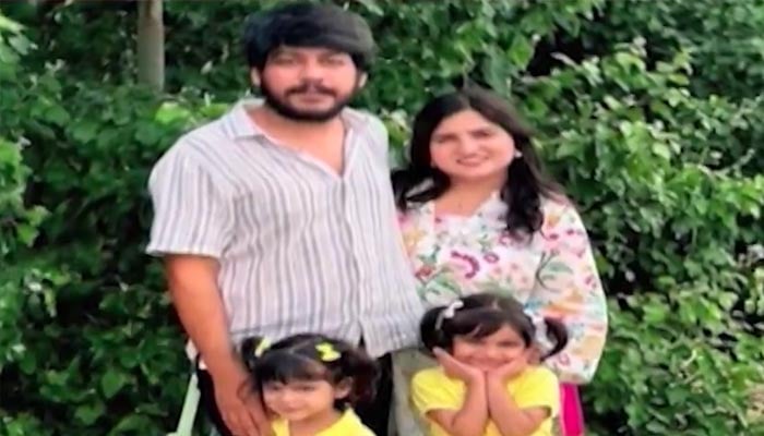 This screengrab shows Ali Murtaza, trader who was killed in a firing incident in Balochistans Dasht area, poses with his family. — YouTube/Geo News