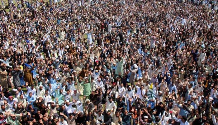 Supporters of the banned Joint Awami Action Committee (JAAC) chant slogans following a shutter-down strike in Muzaffarabad on October 2, 2025. — Reuters