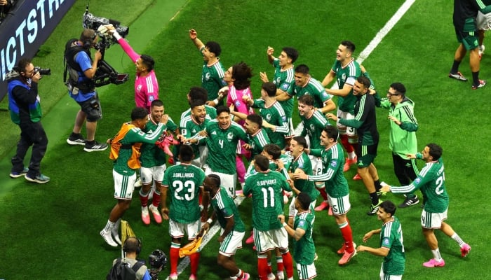 Mexico players celebrate after defeating Ecuador in the Round of 32 to qualify for the World Cup Round of 16 at Estadio Azteca, Mexico City, Mexico, June 30, 2026. — Reuters
