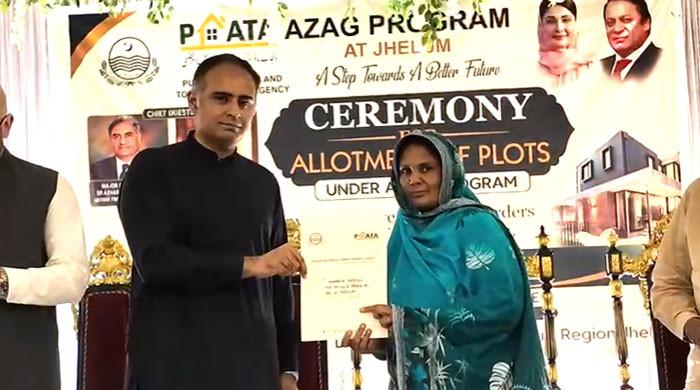 Allotment letters distributed to beneficiaries under ‘Apni Zameen Apna Ghar' scheme in Jhelum