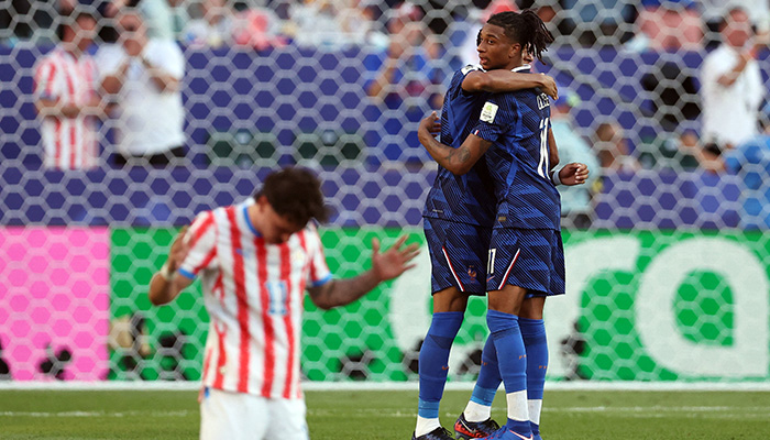 Frances Michael Olise and Kylian Mbappe celebrate after the match. — Reuters