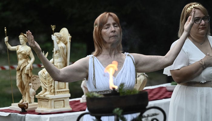 Reenactors dressed as ancient Greeks perform a ritual at the foothills of Mount Olympus as part of the four-day Promitheia Festival honouring ancient Greek Gods, near Litochoro, northern Greece, on July 3, 2026.— AFP