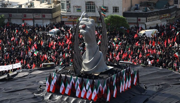 A monument in the form of a raised fist of the deceased supreme leader of Iran Ali Khamenei stands in Enghelab Square, as mourners gather on the day of a funeral procession for Irans late Supreme Leader Ayatollah Ali Khamenei, who was assassinated on February 28 in Israeli and US airstrikes, in Tehran, Iran, July 6, 2026. — Reuters