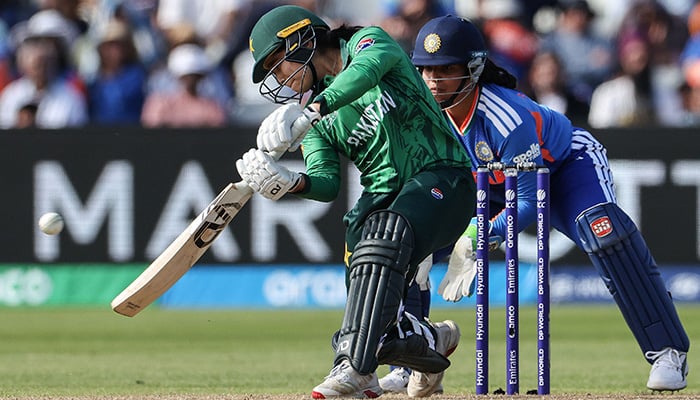 Pakistans captain Fatima Sana (L) hits the ball to be caught out during the ICC Womens T20 cricket World Cup 2026 Group A stage, Match 6 match between the India and Pakistan at Edgbaston cricket ground in Birmingham, central England on June 14, 2026. — AFP