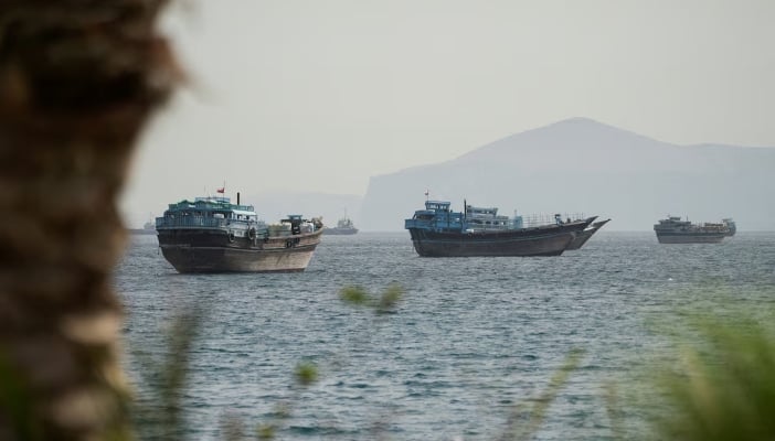 Vessels sail through the Strait of Hormuz, Musandam, Oman, May 22, 2026. — Reuters