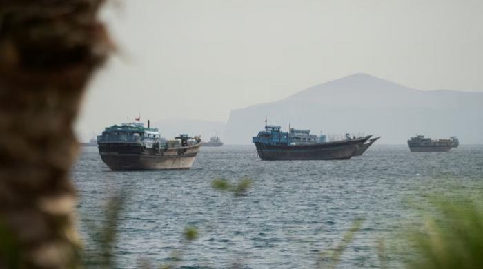 Iran fires missiles at commercial ships in Strait of Hormuz: report