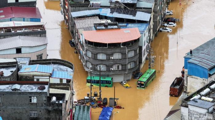 Death toll from China storms rises to 15, hundreds injured