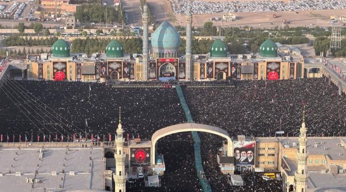 Crowds bid farewell to Khamenei in Iranian holy city of Qom