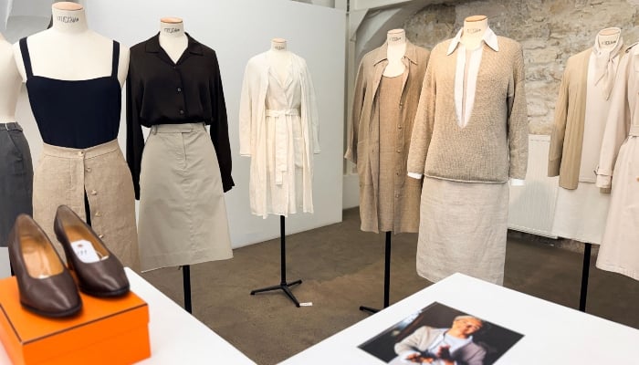 This photograph shows mannequins wearing outfits that Martin Margiela gave to his mother when he was at the helm of the house Hermes during an exhibition at the Quartier General in Paris on July 7, 2026. — AFP