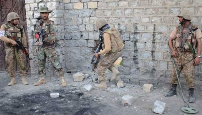 Security forces are seen taking position during an operation in this undated image. — ISPR/File