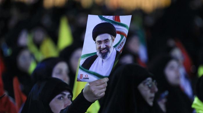 Iran's supreme leader pledges revenge for late father and predecessor