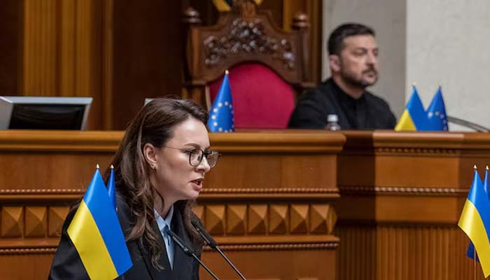 Newly appointed Ukrainian Prime Minister Yulia Svyrydenko attends a session of Ukrainian parliament as Ukrainian President Volodymyr Zelenskiy looks on, amid Russias attack on Ukraine, in Kyiv, Ukraine July 17, 2025.