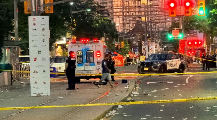 Two dead, several hurt in Toronto shooting, attacker at large