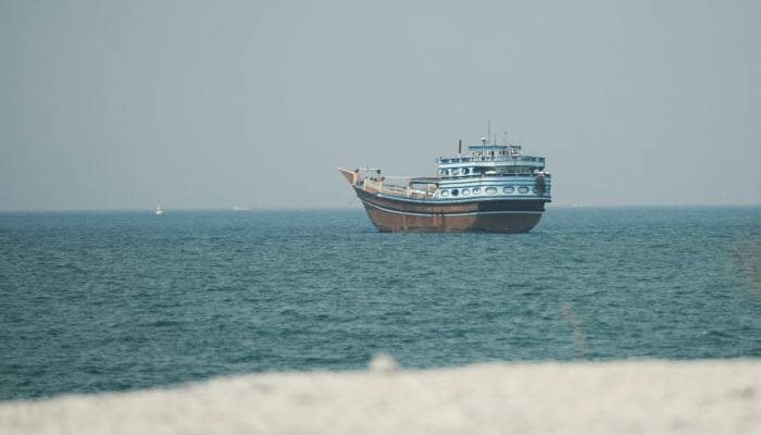 A vessel at the Strait of Hormuz, as seen from Musandam,Oman, July 13, 2026. — Reuters