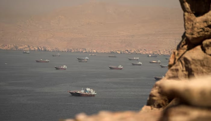 Vessels at the Strait of Hormuz, as seen from Musandam, Oman, June 18, 2026. — Reuters