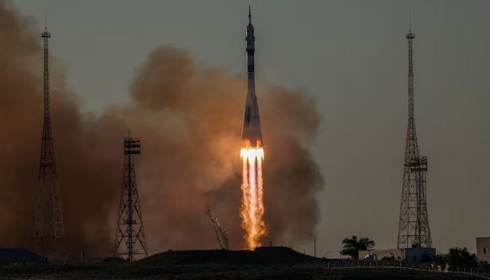 The Soyuz MS-29 spacecraft carrying NASA astronaut Anil Menon, Roscosmos cosmonauts Pyotr Dubrov and Anna Kikina lifts off to the International Space Station (ISS) from the launch pad at the Baikonur Cosmodrome, Kazakhstan, July 14, 2026. — Reuters
