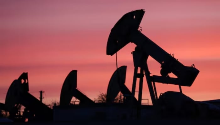 Sunset clouds glow over pump jacks at the Airankol oil field operated by Caspiy Neft in the Atyrau region, Kazakhstan, April 21, 2026. — Reuters